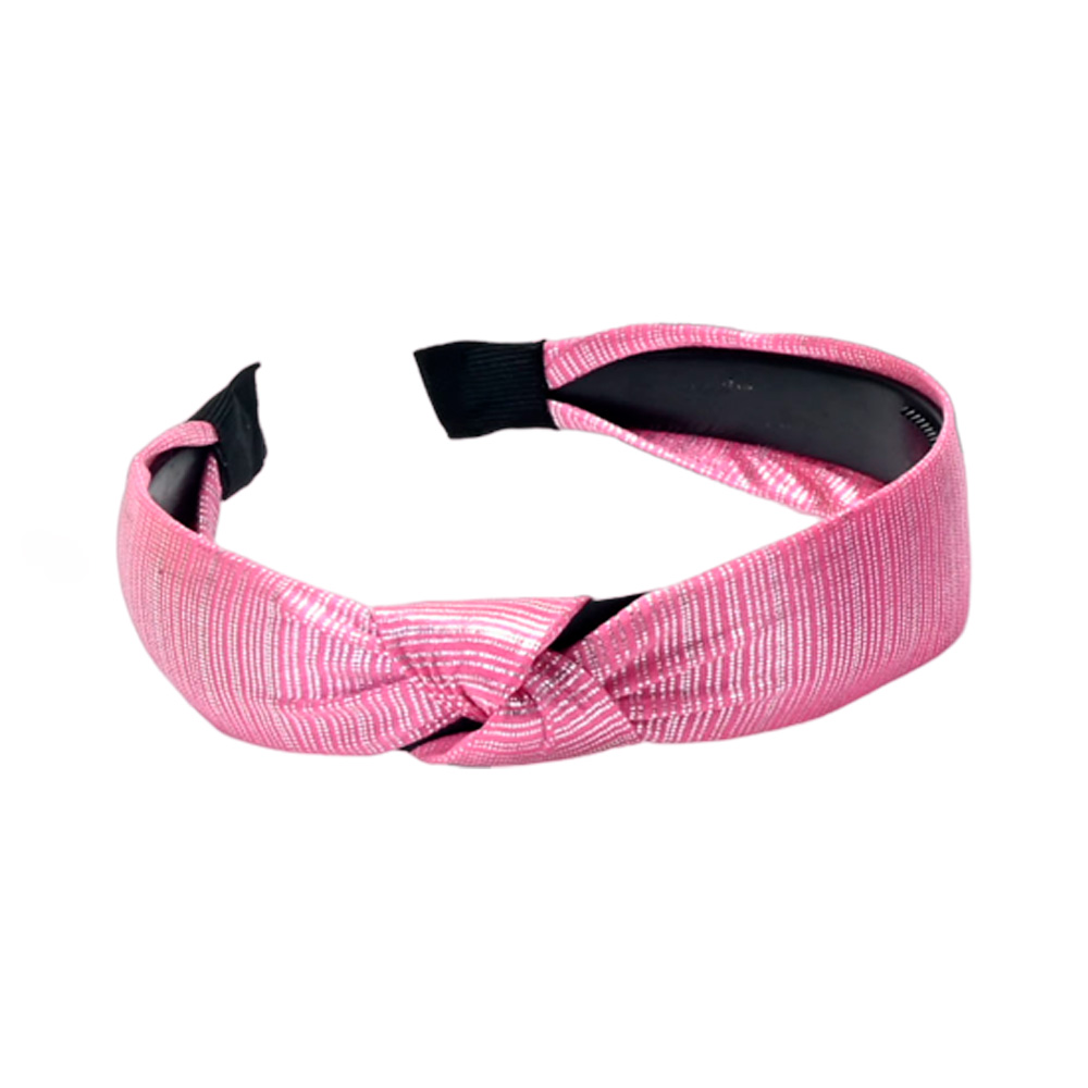 VINCHA RIGIDA CON TEXTURA BRILLOSA.