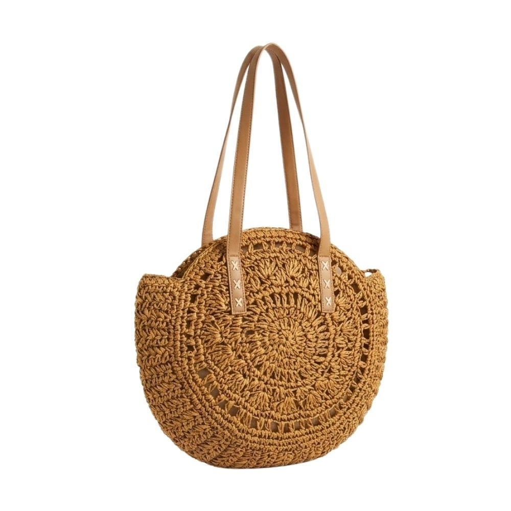 BOLSO DE PLAYA REDONDO DE RAFIA CON MANIJA